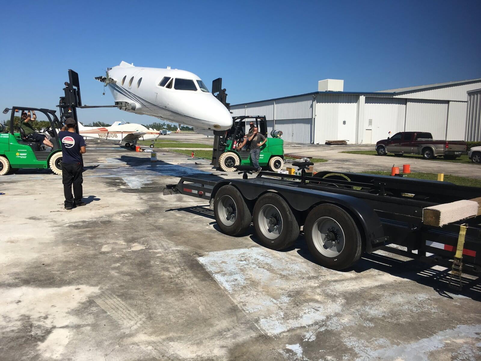 SEAL Aviation hauling away an aircraft for disposal