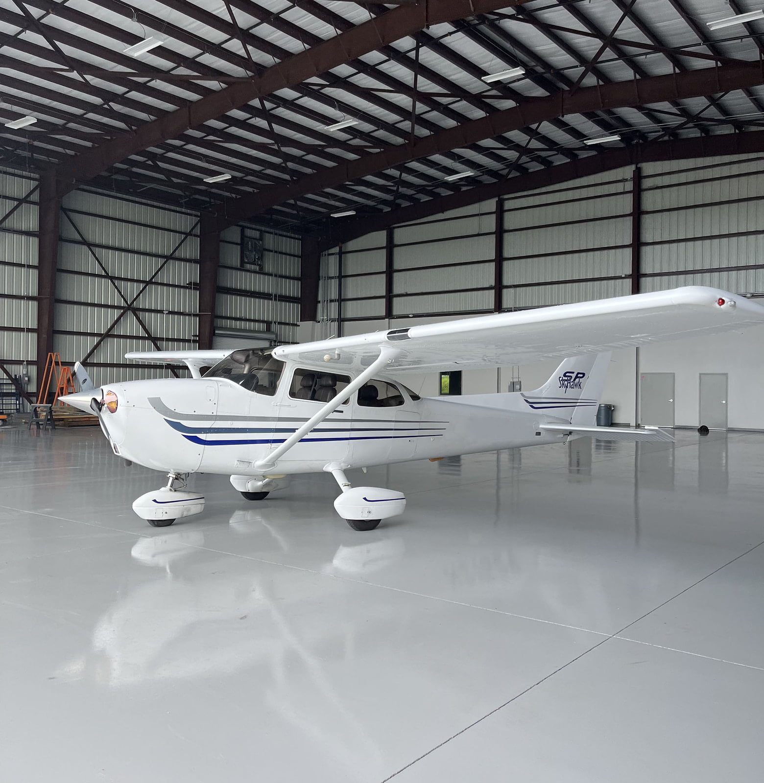 Cessna 172S Skyhawk in the new hangar for fuel leak maintenance