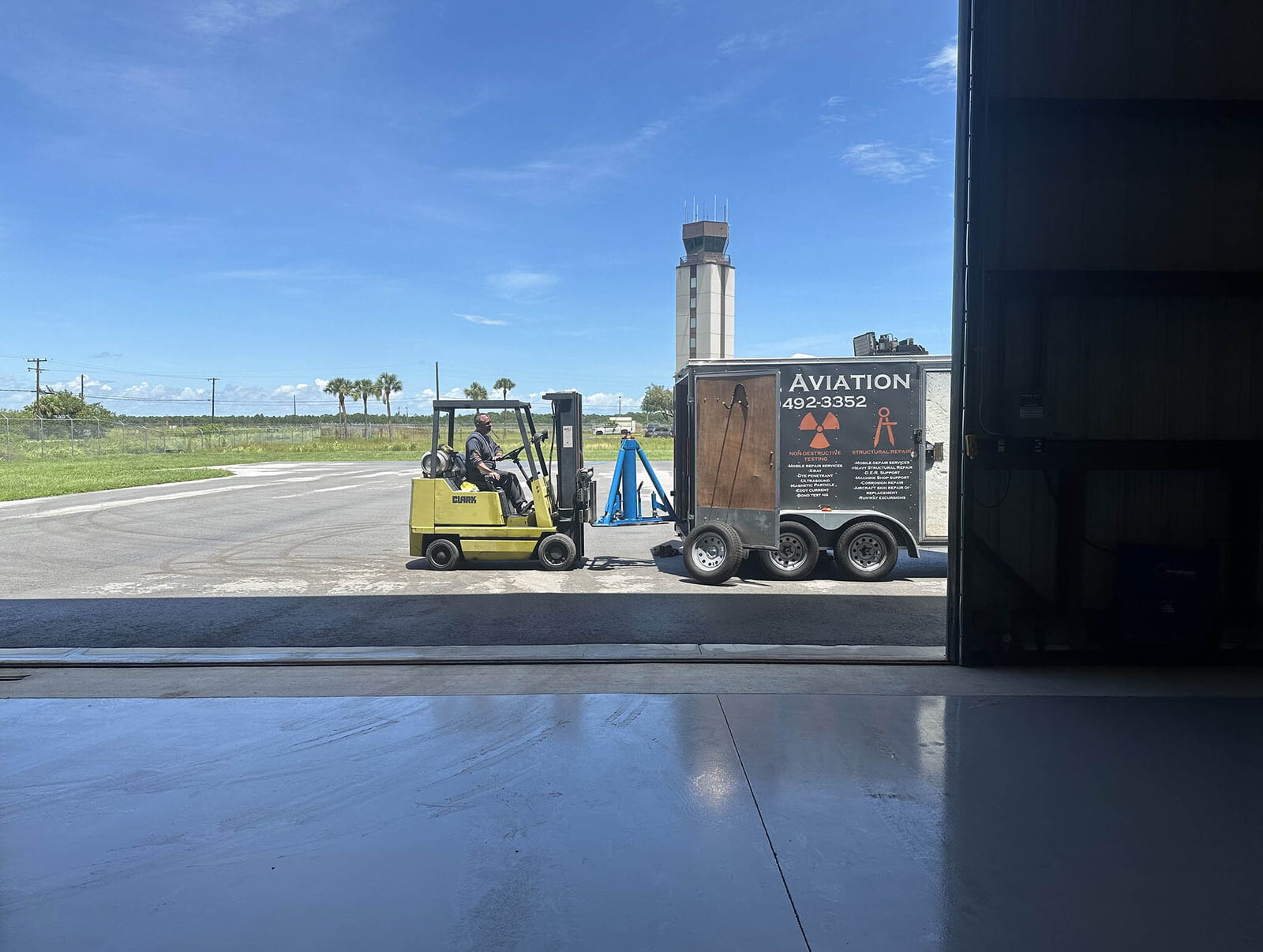 Unloading jack stands at the new location in Fort Pirece
